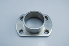 Oblong base flange with four holds